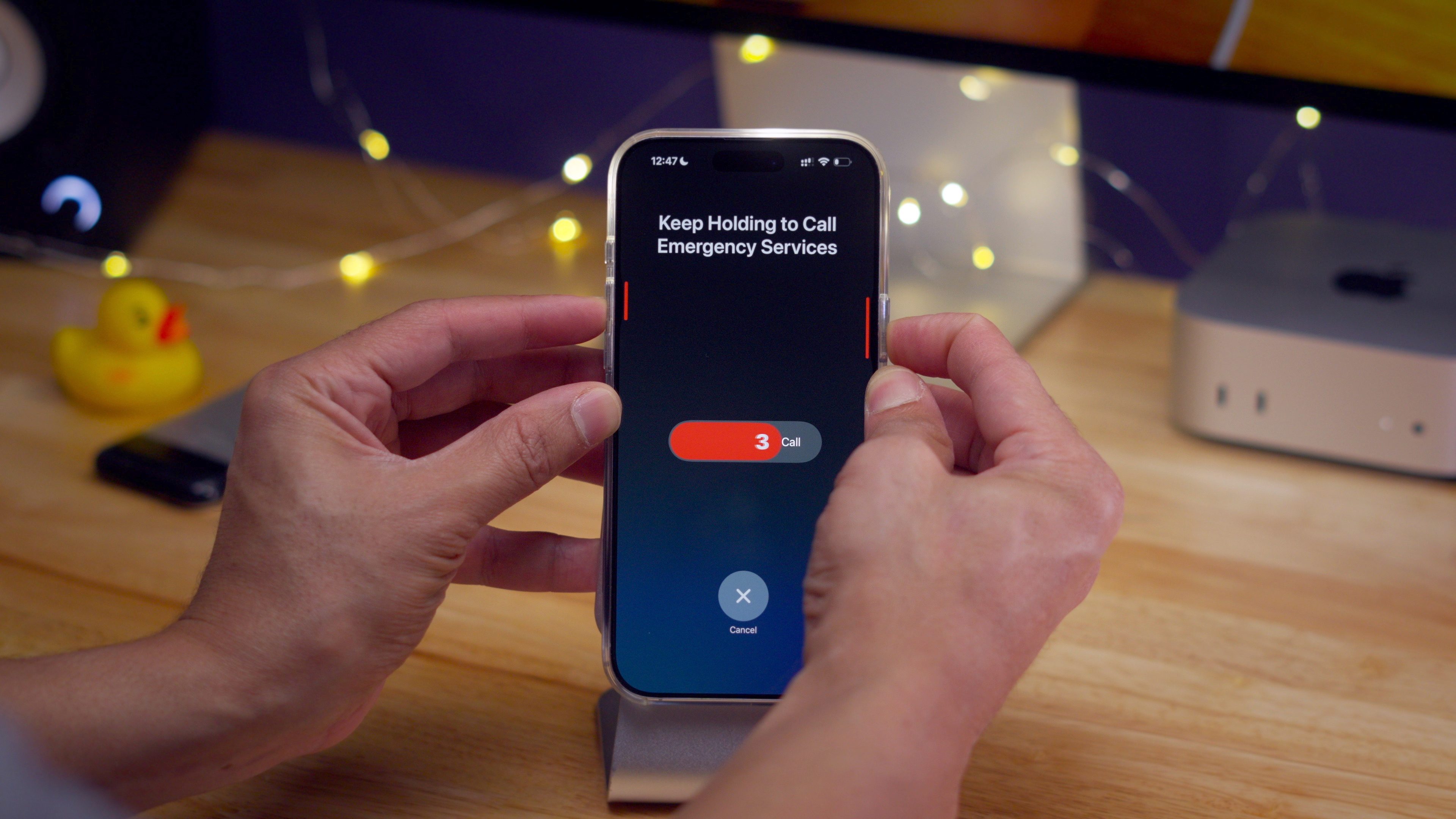Invoking Emergency SOS iPhone 16 by long-pressing volume and Side buttons
