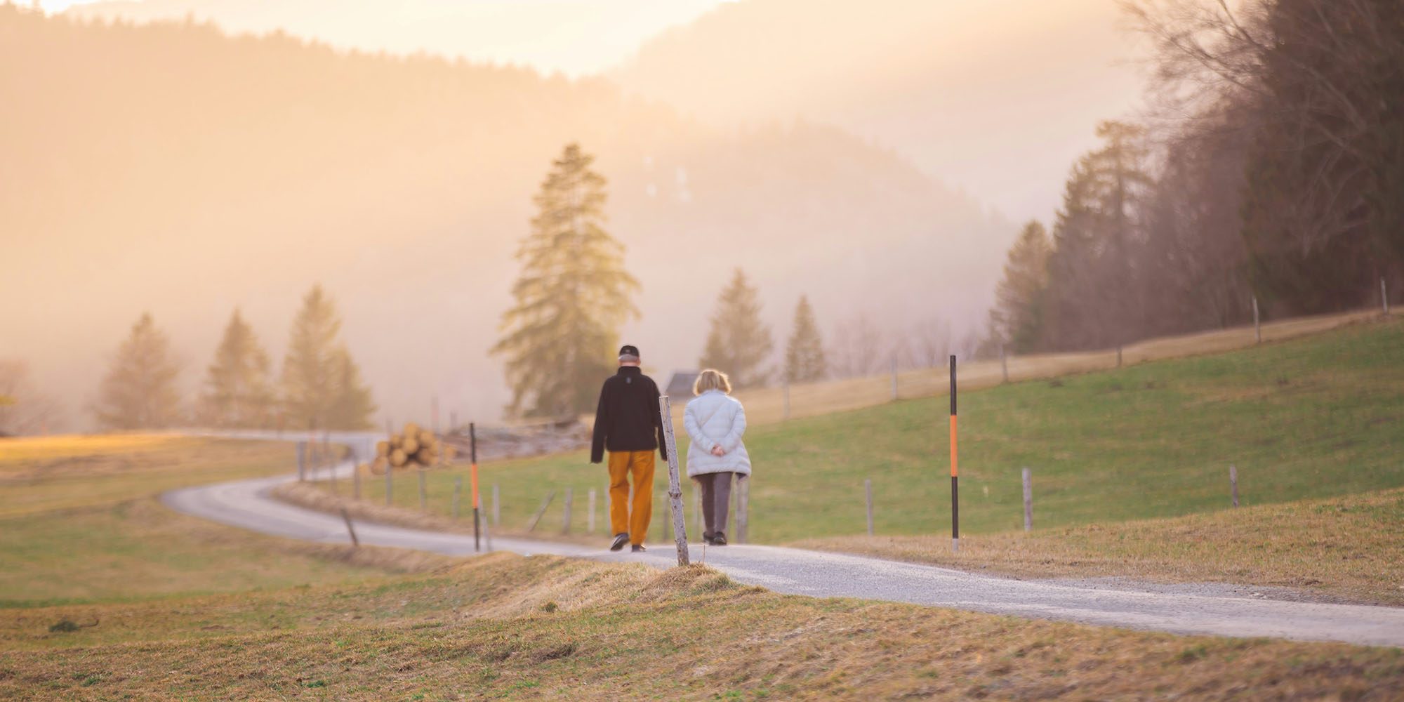 Apple outlines 50 ways to make devices easier to use as we age | Photo shows two seniors out for a walk in the countryside